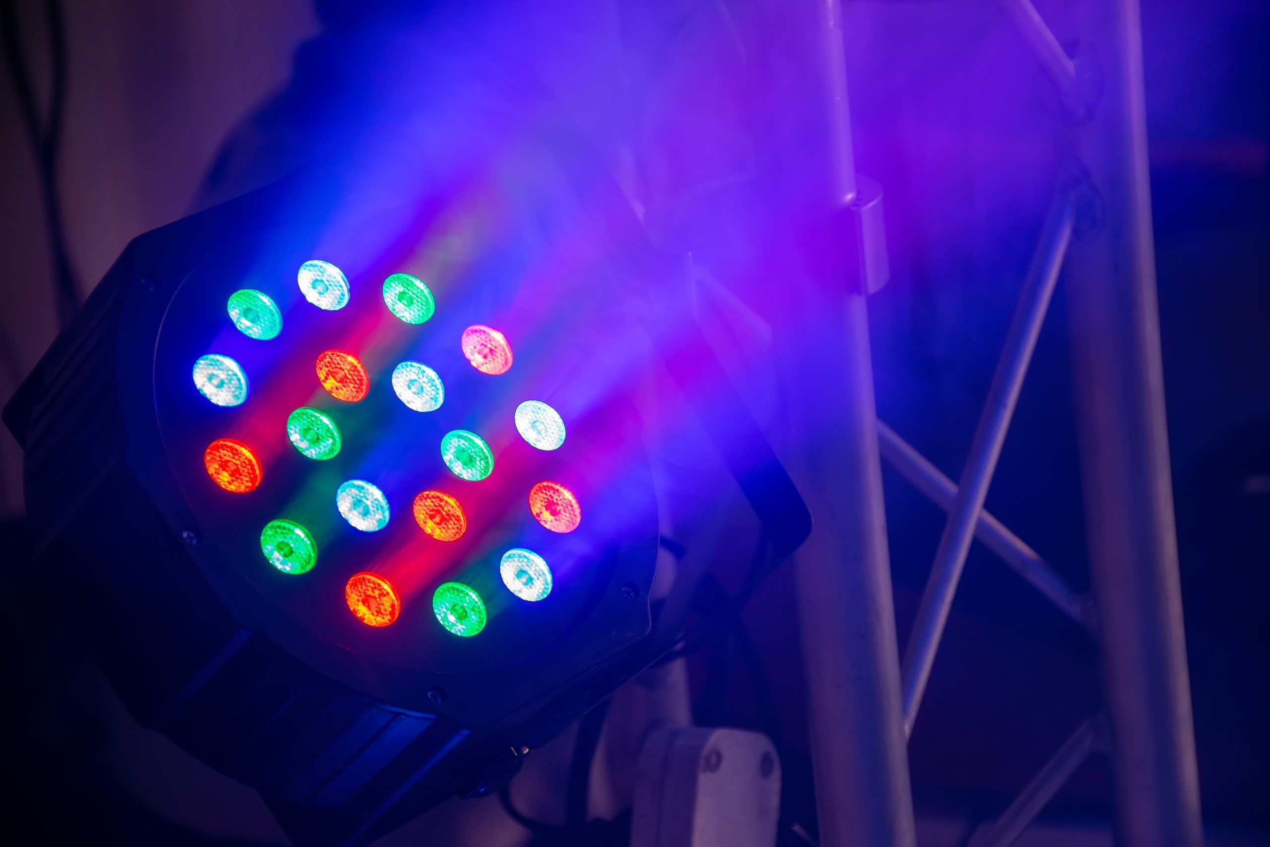 Multicolored soffits illuminate the night party.